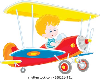 Little boy piloting a colorful toy plane on a playground in a park, vector cartoon illustration on a white background