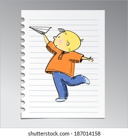 little boy with a plane drawn on notebook sheet