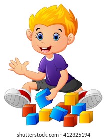 little boy play bricks