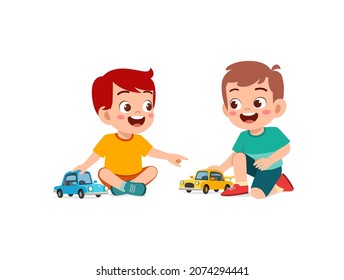 little boy play with small toy car with friend