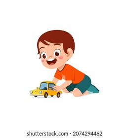 little boy play with small toy car