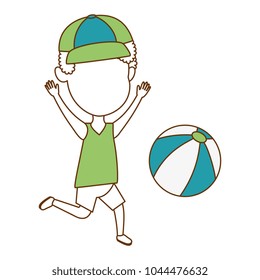 little boy playing with beach balloon