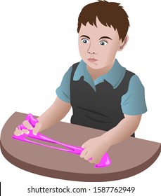 Little boy playing with homemade pink slime