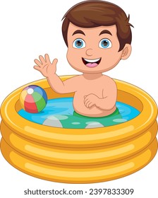niño pequeño jugando en la caricatura inflable del pool