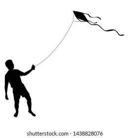 Little boy is playing the kite silhouette vector