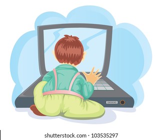 little boy playing laptop from back view