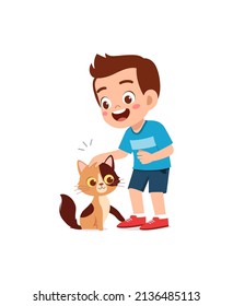 little boy playing together with cute cat