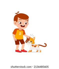 little boy playing together with cute cat