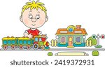 Little boy playing with a toy railway train and a station in his playroom, vector cartoon illustration on a white background