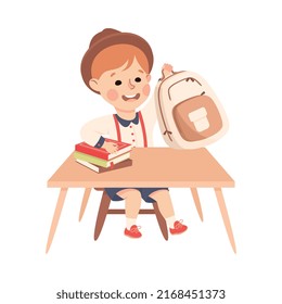 Little Boy Pupil Sitting at Table with Book Engaged in Elementary Education Vector Illustration