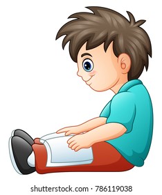 Little boy reading a book