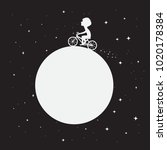 Little boy rides around the Moon on bicycle.Space childish vector illustration.Prints design