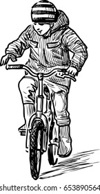 Little boy riding a bicycle