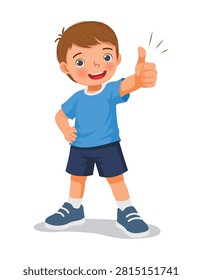 Little boy showing thumb up gesture