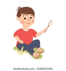 Little Boy Sitting on Green Lawn with Skewered Fried Marshmallow Vector Illustration