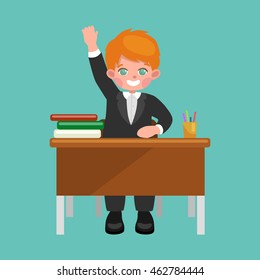 little boy sitting at the table with notebooks and books, learning back to school concept