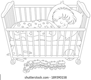 Little boy sleeping in his bed