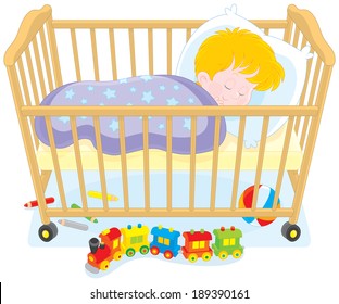 Little boy sleeping in his bed