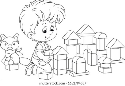 Little boy smiling, playing with bricks and constructing a toy fortress for a game, black and white vector cartoon illustration for a coloring book page