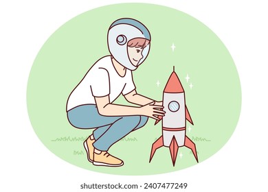 Little boy squatting near toy rocket representing launching spaceship to another planet. Child plays as astronaut, wanting to work in space industry and launch intergalactic ships. Flat vector design