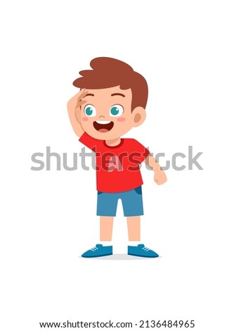 little boy standing and try to see far away