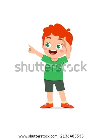 little boy standing and try to see far away