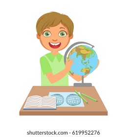 Little boy studying geography with globe on study table, a colorful character