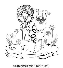 little boy with surprise box and elf head in the field
