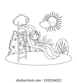 little boy with swimwear on slide in the park