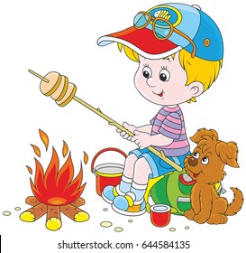 little boy traveler and his small pup cooking bread on fire