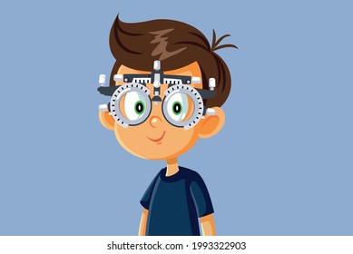 Little Boy Undergoing Eye Test with Phoropter. Child having eyesight checked by professional oculist for early detection of vision problems
