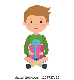 little boy with winter clothes and gift