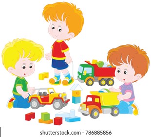 Little boys playing with toy cars and bricks