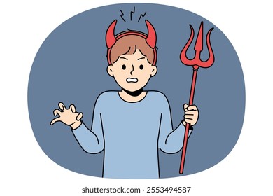 Little bully boy with devil horns makes evil grimace and terrorizes teachers at school or kindergarten. Schoolboy bully with trident angry at adults because of refusal to go for walk together