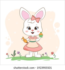 Little bunny holding a special decorated cupcake