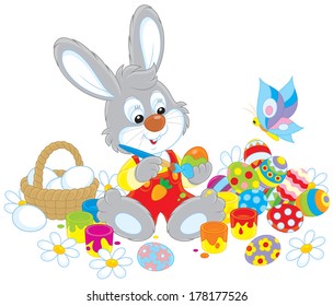 Little Bunny paints Easter eggs