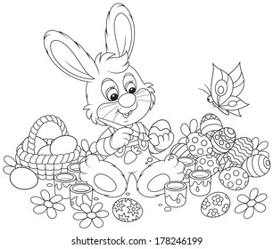 Little Bunny paints Easter eggs