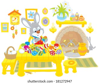 Little Bunny paints Easter eggs
