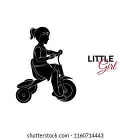 Little child, baby. Little girl riding a bicycle