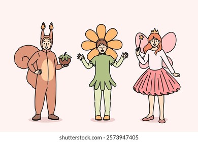 Little children in carnival costumes of squirrel or fairy and flower are ready to go to masquerade party at school. Boy and girls gathered for masquerade dedicated to end of studies in kindergarten