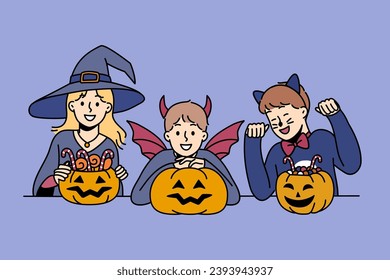 Little children in halloween attire hold pumpkins with treats and smile, rejoicing in coming of october 31st holiday. Boys and girls prepare to celebrate halloween or collect treats from neighbors