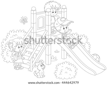 little children playing on a slide at a playground
