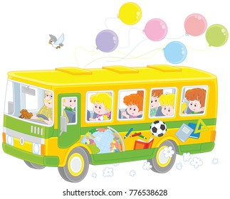 Little children riding a school bus