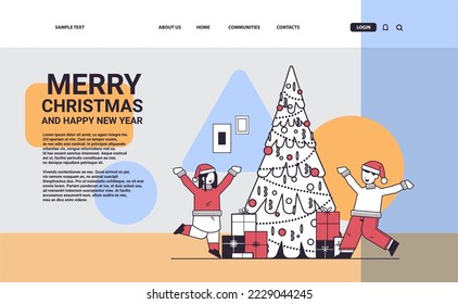 little children in santa hats happy to found gifts near fir tree new year christmas holidays celebration concept