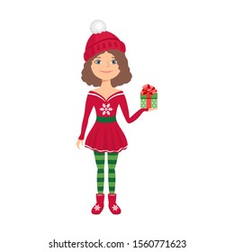 Little christmas girl in red hat holds gift box with bow. Cute little girl celebrates New Year isolated on white background. Vector illustration of happy kid in cartoon simple flat style.
