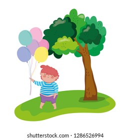 little chubby boy with balloons helium in the landscape