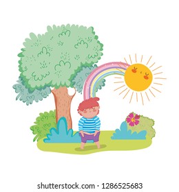 little chubby boy with rainbow in the landscape