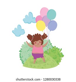 Little chubby girl with balloons air in the landscape