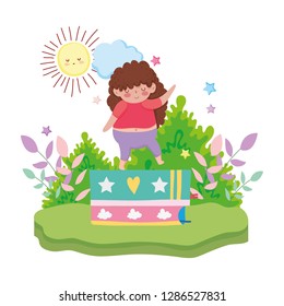 Little chubby girl with pile books in the landscape