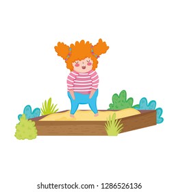Little chubby girl playing in sand box